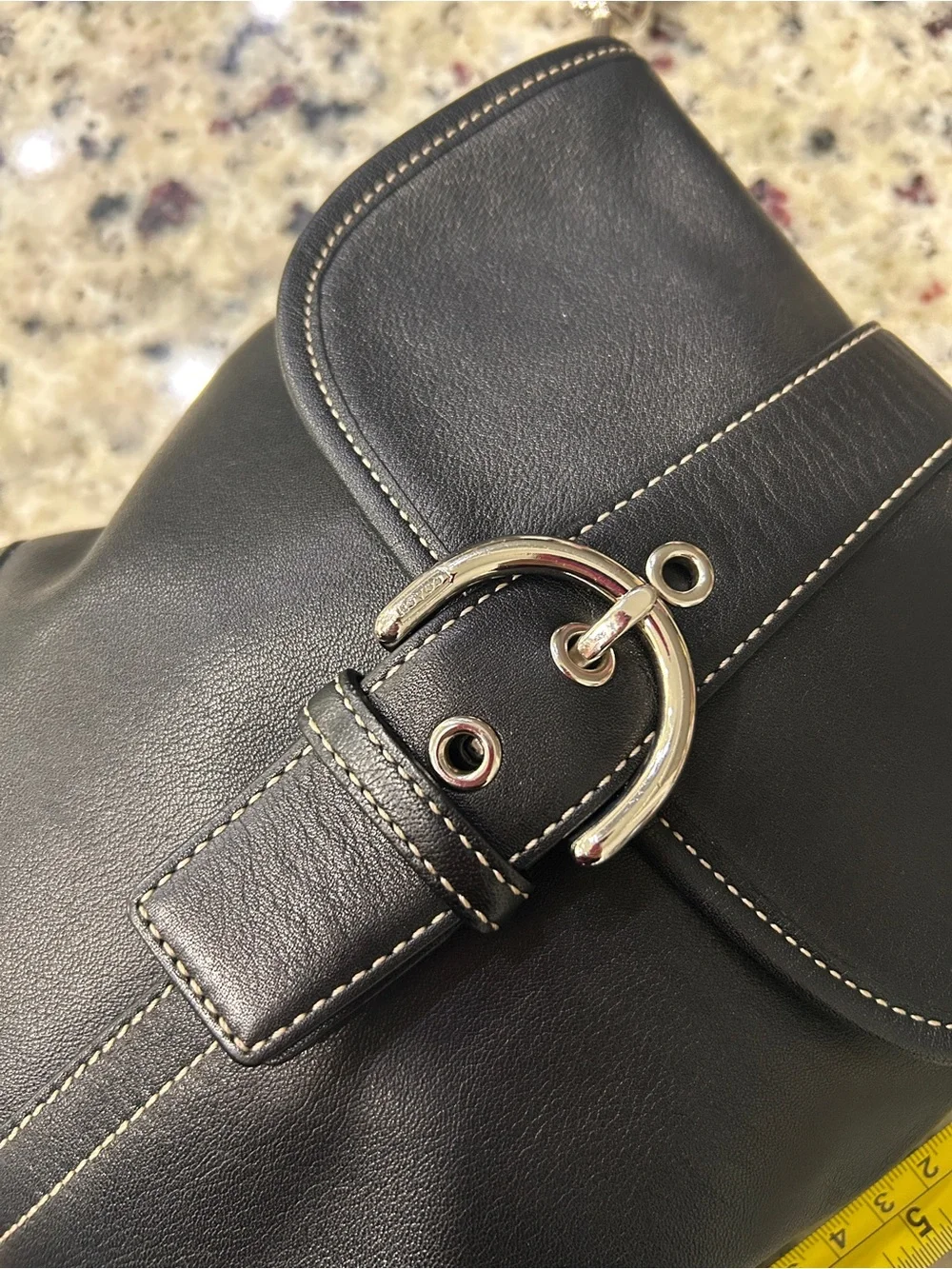 Classic Black Leather Backpack with Silver Buckle